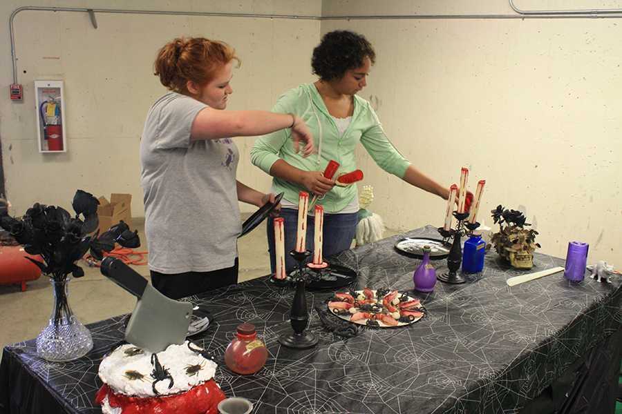 Student Council members help decorate for the sophomore class fundraiser, a haunted house, last week. The fundraiser raised over $1000 and was a huge success.