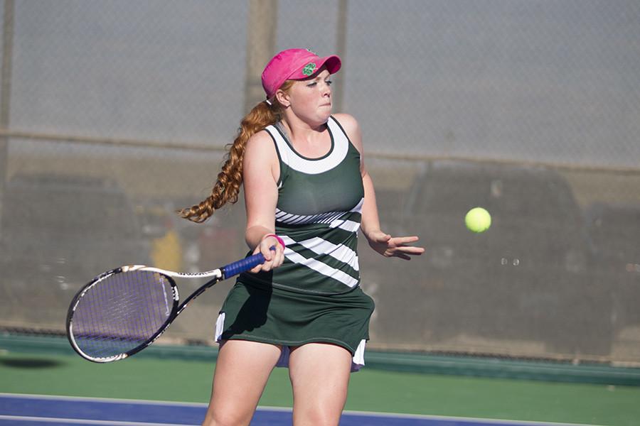 Senior Allyn Harris, who played #1 singles for the Lady Trojans, plays in a match against Natrona in September.