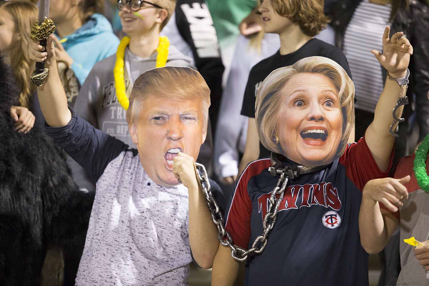 Juniors Thayne Macy and Willis Schneider don Hillary Clinton and Donald Trump masks at the home football game against Cheyenne south. The presidential election has been the story of the year nationally and locally too.