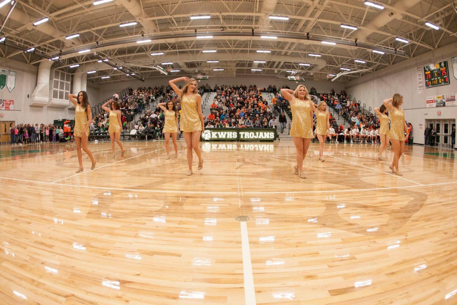 The KW Dance Team performs during halftime of the boys Peach Basket. The team took 1th place at Nationals in both Small Hip Hop and Small Pom.