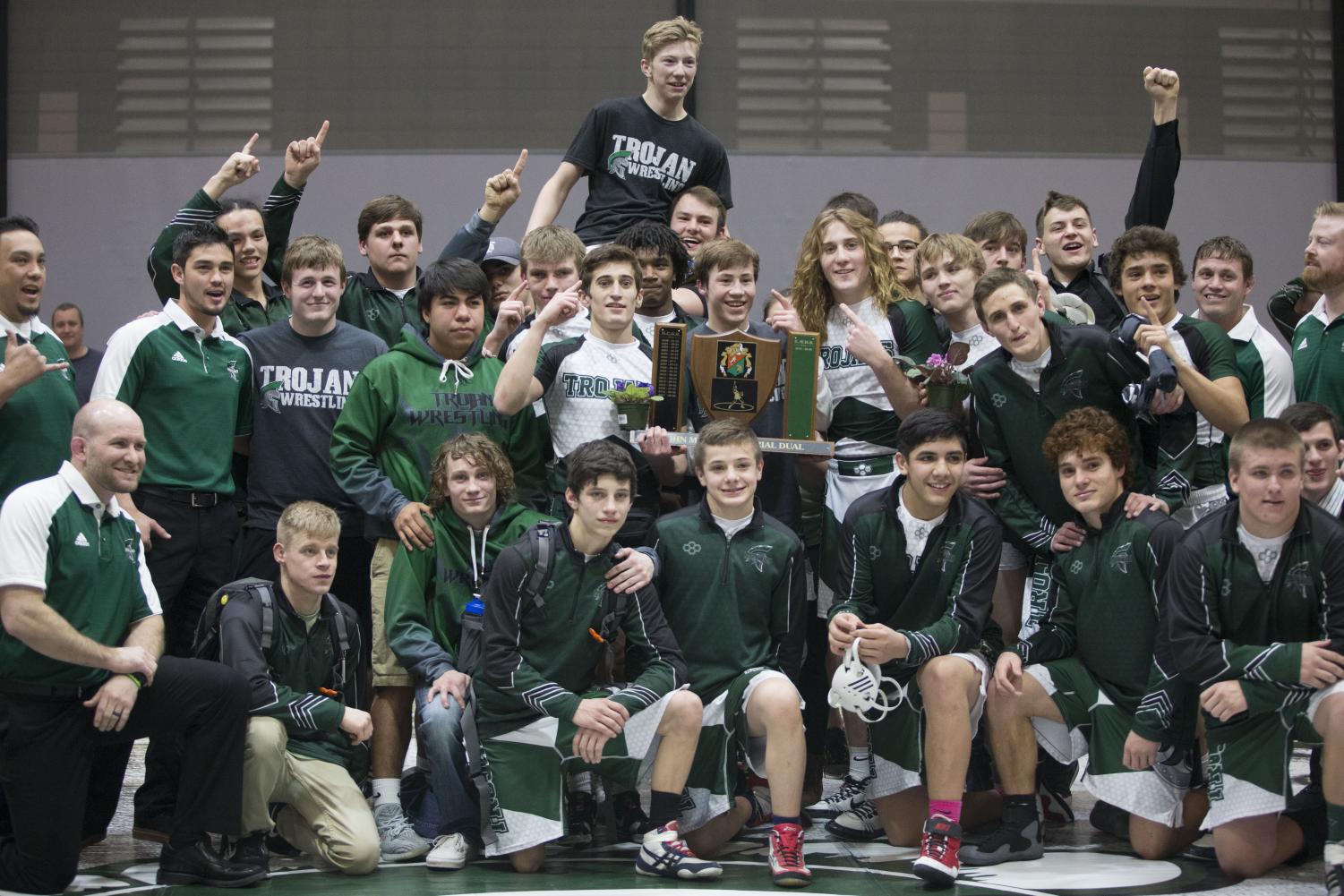 Miller Cup Champs! The 2018 Trojan Wrestlers Dominated the Mustangs for only their second win since the trophy was started in 2000.