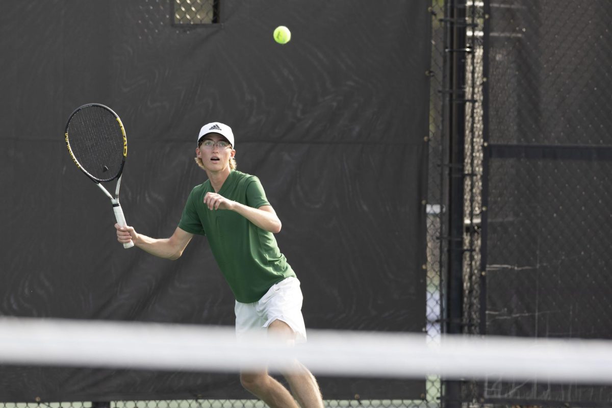 Senior Cooper Levin looks to return the ball in his 2 Doubles match verses Natona on September 10th at the new Casper Tennis Complex.